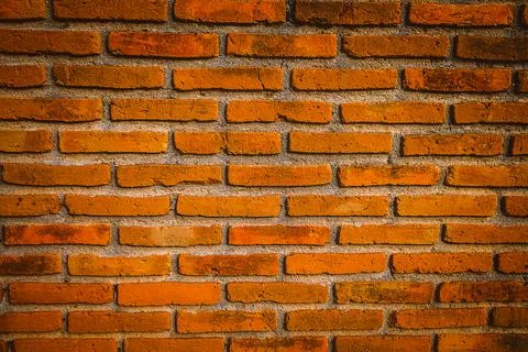 Orange brick wall background Stock Photos