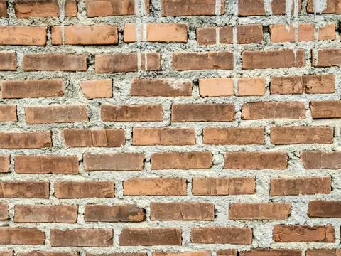 Orange brick wall for background use Stock Photos