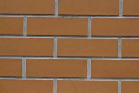 Orange brick wall concept background Stock Photos