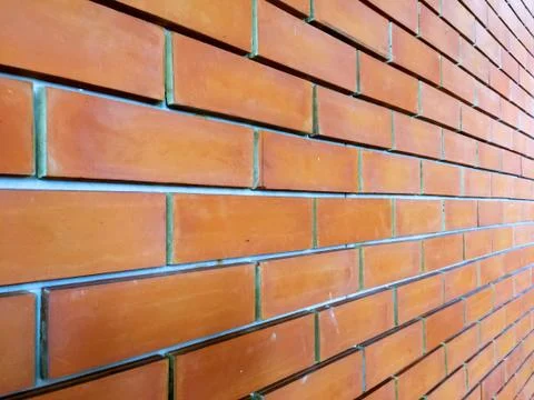 Orange Brick Wall Perspective Background Foto stock