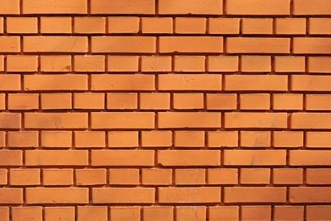 Orange brick wall Stock Photos