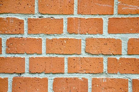 Orange brick wall Stock Photos