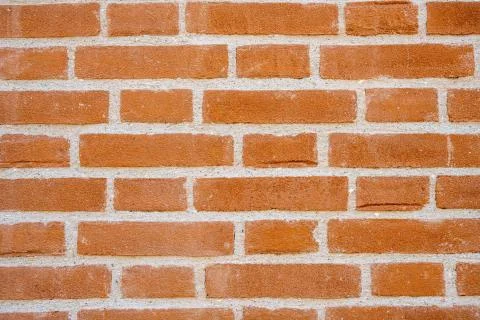 Orange brick wall Stock Photos