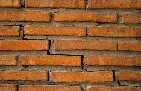 Orange brick wall texture background with copy space for text. Foto stock