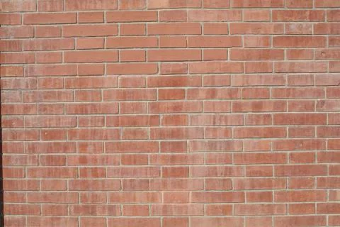 Orange brick wall texture or abstract background Stockfoto's