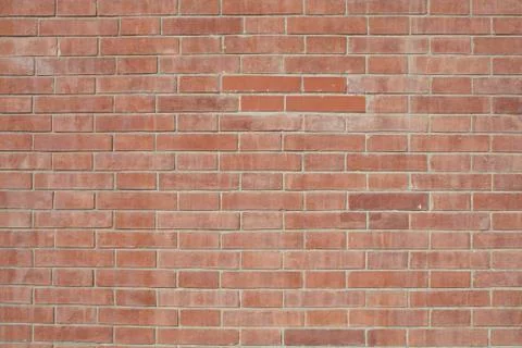 Orange brick wall texture or abstract background Stock Photos