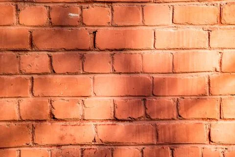 Orange brick wall texture Stock Photos