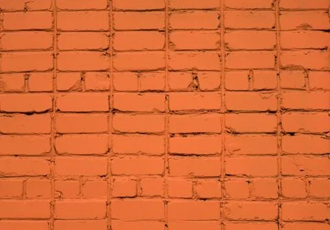 Orange bricks background. Painted brick wall. Orange brick wall background. B Stock Photos