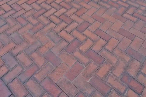 The Orange bricks pattern texture floor, Herringbone Brick Pavers Stock Photos