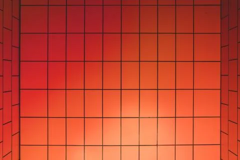 Orange bricks pattern on wall for abstract background Stock Photos