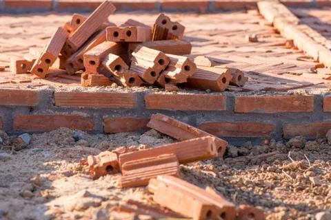 Orange bricks on the pavement Stock Photos