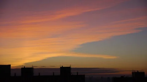 Orange bright clouds float across the sky before sunrise Stock Footage 123603629