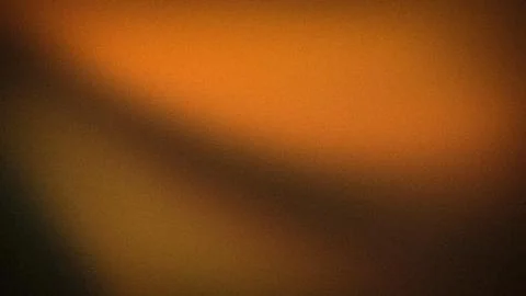 Orange Brown Dark Gradient Abstract Grainy Background Blur 4K Grain Texture.. Foto stock