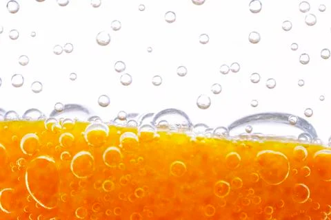 Orange with bubbles Stock Photos