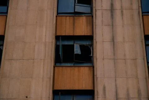 Orange Building with Broken Windows Stock Photos