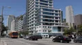 Orange Bus passing in Downtown Los Angeles, LA, California, USA HD Footage