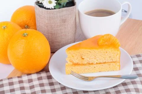 Orange cake with coffee Stock Photos