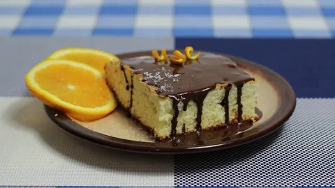 Orange cake grated coconut and chocolate Stock Footage 70339653