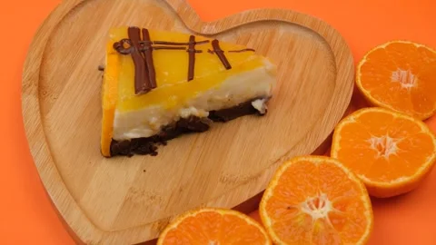 Orange cake rotate Stock Footage 261825469