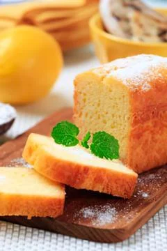 Orange cake slice with mint decoration Stock Photos