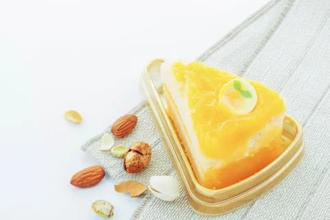 Orange cake on white background. Stock Photos