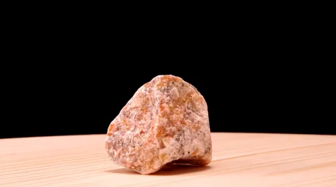 Orange calcite Stock Footage 32395996
