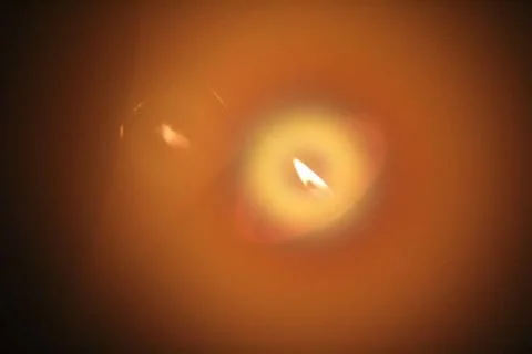 Orange candle flame Stock Photos