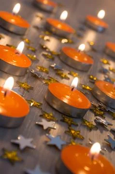 Orange candles Stock Photos