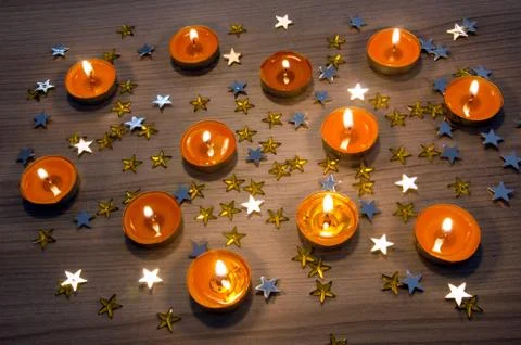 Orange candles Stock Photos