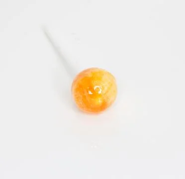 Orange candy isolated in white background Stock Photos