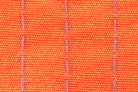 Orange canvas texture or background Stock Photos