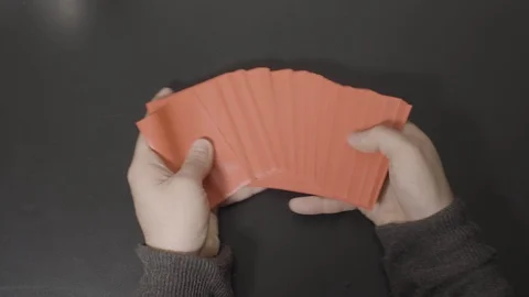 Orange Cards Spread Across Desk Stock Footage 100559643