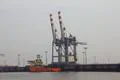 Orange Cargo Ship at the Docks 1681 Photo