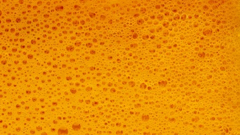 Orange carrot vegetable smoothie  in macro view. Healthy lifestyle food concept. Stock Footage 103473984