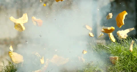 Orange carved pumpkin explodes in slow motion Video stock 145054443