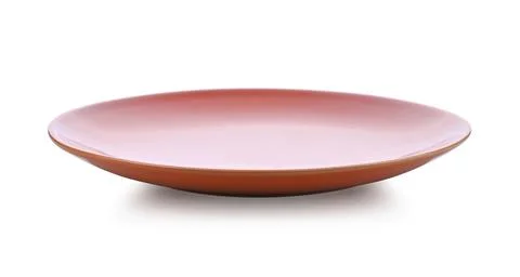 Orange ceramic plate isolated on white background. Stock Photos