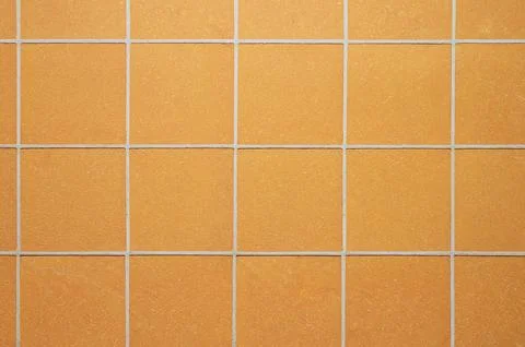 Orange ceramic tile background in a minimalist style. Interior design concept 写真素材