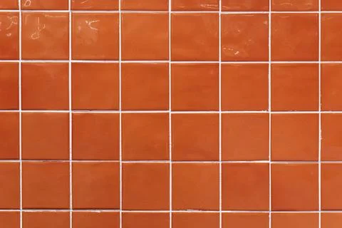 Orange ceramic tile background. Old vintage ceramic tiles in green to decorate Foto stock