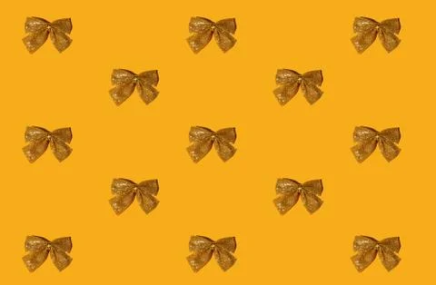 Orange christmas background seamless pattern bow Stock Photos