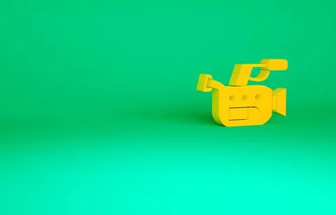 Orange Cinema camera icon isolated on green background. Video camera. Movie s Stock Illustration