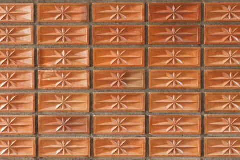 Orange clay brick wall for pattern and background Stock Photos