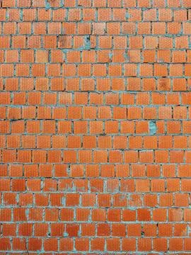 Orange clay building blocks pattern as design element 스톡 사진