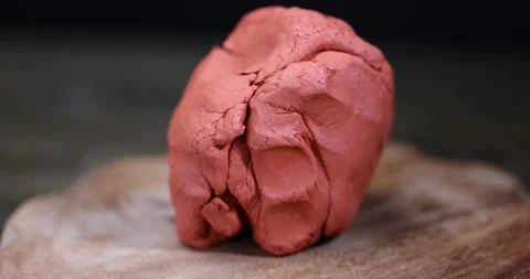 Orange clay for modeling and modeling of various products, a special paste with Video stock 291373741
