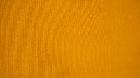 Orange cloth texture as background Stock Photos