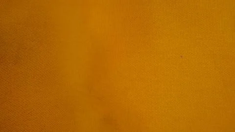Orange cloth texture as background Stock Photos