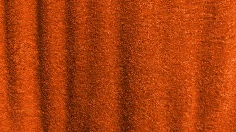 Orange cloth texture wavy background with a place for text Stock Photos