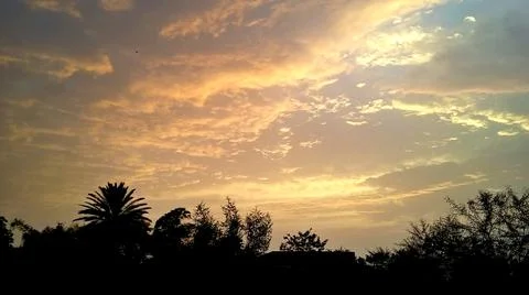 Orange clouds on sky Stock Photos