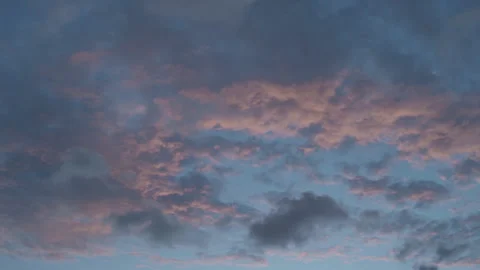Orange Clouds Slow Timelapse Against a Blue Sky Video stock 290976345
