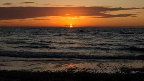 Orange clouds at sunset. Stock Photos
