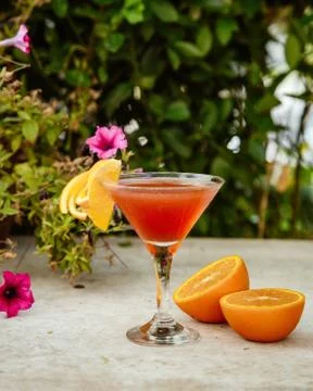 Orange cocktail on the table Stock Photos